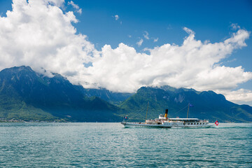 Montreux Riviera on a beautiful summer day with a steamboat in Lake Geneva