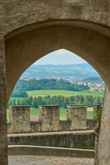 Arch of a castle and landscape