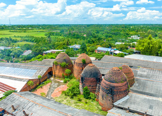 Aerial view of Mang Thit brick kiln in Vinh Long. Burnt clay bricks used in traditional...
