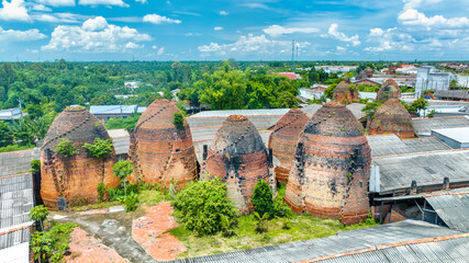 Aerial view of Mang Thit brick kiln in Vinh Long. Burnt clay bricks used in traditional construction of Vietnamese. Mekong Delta, Vinh Long, Vietnam