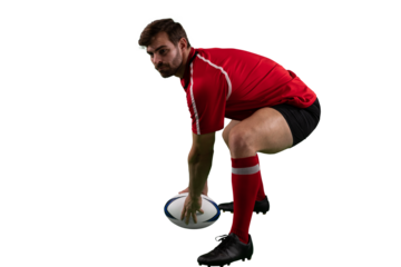 Digital png photo of caucasian male rugby player squatting on transparent background