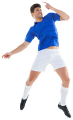 Digital png photo of caucasian male soccer player jumping on transparent background