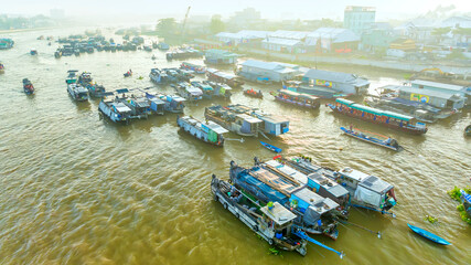Fototapeta na wymiar Cai Rang floating market, Can Tho, Vietnam, aerial view. Cai Rang is famous market in mekong delta, Vietnam.