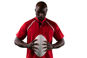 Digital png photo of african american male rugby player with rugby ball on transparent background