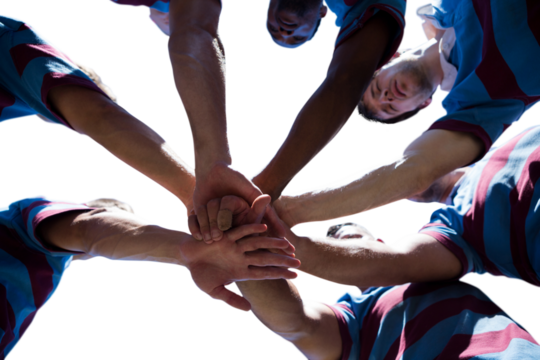 Digital png photo of diverse male rugby players teaming up on transparent background