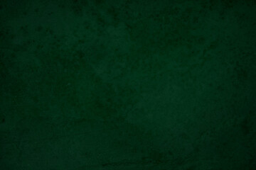 Green board. Dark green wall backdrop. Education concepts.