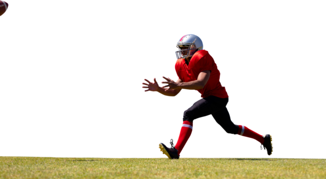 Digital png photo of biracial male american football player catching ball on transparent background