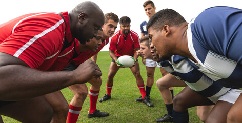 Fototapeta premium Digital png photo of diverse two groups of male rugby players on transparent background