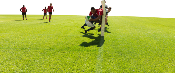 Digital png photo of diverse male rugby players playing at stadium on transparent background