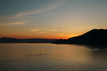 Sunset moody night seascape with a view on the bay.