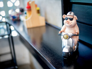 pig doll driving a motorcycle