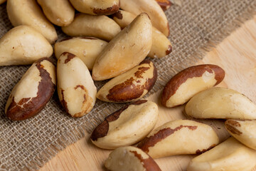 Fresh Brazil nuts peeled from the shell on the table