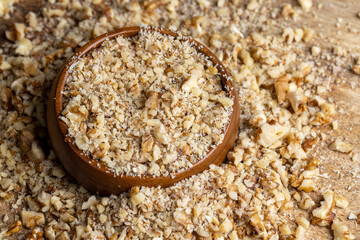 Crushed dried walnuts on the table