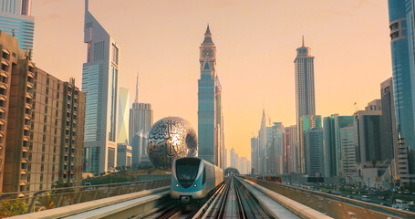 Dubai, UAE, United Arab Emirates. Monorail POV Subway train rides among skyscrapers, Museum of the...