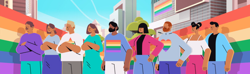 mix race people with lgbt rainbow flags gay lesbian love parade pride festival transgender love concept