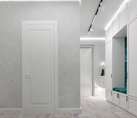 3D visualization of a hallway with a mirror at the entrance in light colors, a comfortable soft seat and lockers for outerwear. Modern interior.  Minimalizm. Design concept