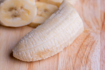 Sliced ripe banana on a cutting board