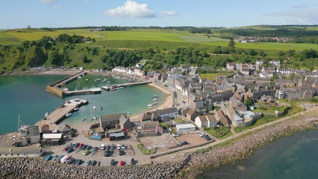 Aerial drone video of the harbour in the town named Stonehaven, Scotland