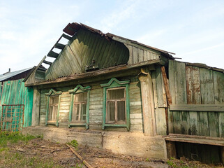 Photo of an old one-story village house