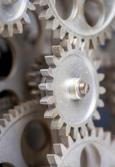 Close view of old clock mechanism with gears and cogs. Conceptual photo for your successful business design. Copy space included.