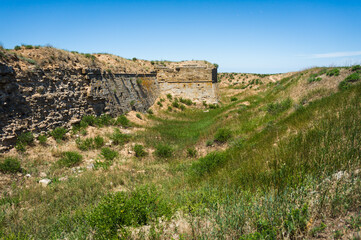 Remains of a moat and ruins of a Tatar-Turkish fortress Arabat on the Azov coast of Crimea