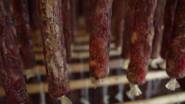 A dried stick of sausage