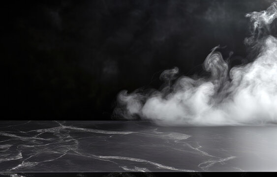 White smoke of black marble table top on a black background. High quality photo