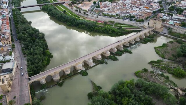 Drone shot of Puente Romano (Roman bridge) in Cordoba, Andalusia, Spain