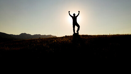 silhouette of a person with success, determination and fighting spirit
