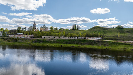 Fototapeta na wymiar panoramic view from a drone of the river and the ancient Kremlin on a sunny day taken from a drone