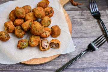  Olive all'ascolana..The typical Italian street-food appetizer with breaded fried olives stuffed of...