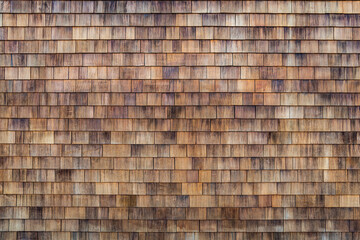 Wood Shake Wall. Wood shake. Grunge cedar tile panel on the exterior wall. Grunge cedar tile panel...