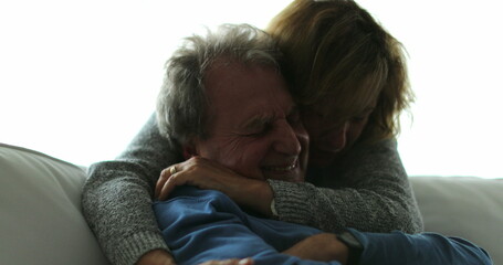 Fototapeta premium Candid senior love and tenderness couple affection