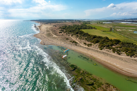 Aerial view of paramotors flying, Mediterranean coast, Belek, Antalya, Turkey.