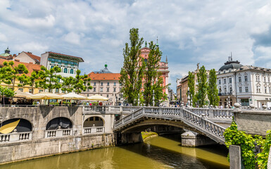 Fototapeta na wymiar A view towards the Triple bridge and Preseren Square in Ljubljana, Slovenia in summertime