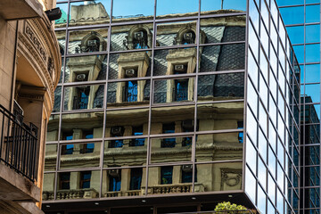 Skyscraper glass facades on a bright sunny day and blue sky. Modern buildings of Buenos Aires,...
