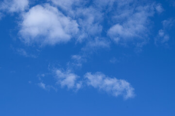 Bright blue sky with white clouds natural background