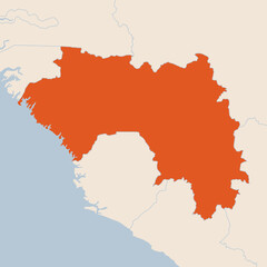 Map of the country of Guinea highlighted in orange isolated on a beige blue background