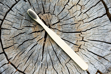 Zero waste bamboo wooden toothbrush as concept of dental health and healthy gums and teeth.Eco...