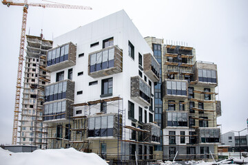 installation of thermal insulation of the facade of an apartment house