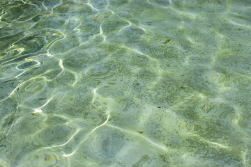 waved water in basin - attractive surface - background