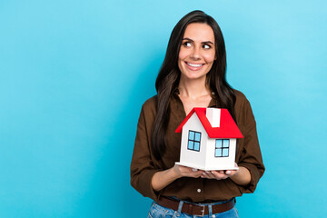 Photo of young student hispanic lady holding building apartment dreaming look empty space insurance...