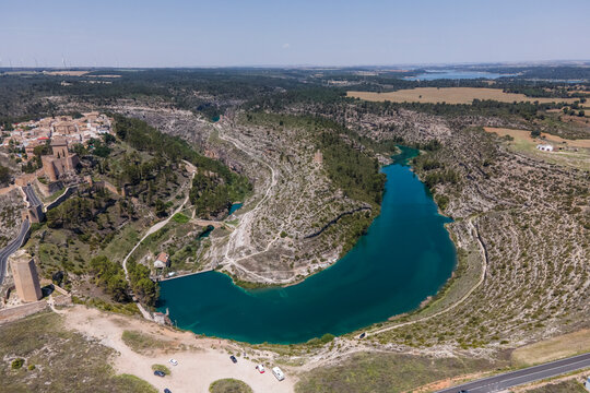 Aerial view of Alarcon, a medieval town with castle on top along the Rio Jucar river in Cuenca, Spain.