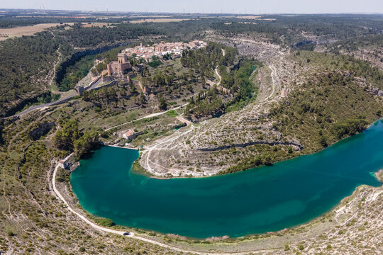 Aerial view of Alarcon, a medieval town with castle on top along the Rio Jucar river in Cuenca, Spain.