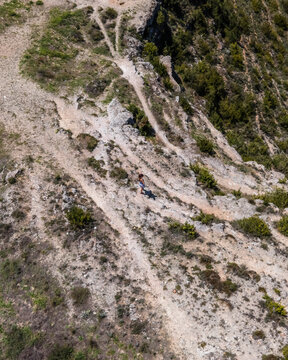 Aerial view of a woman looking the panorama in Alarcon in Cuenca, Spain.