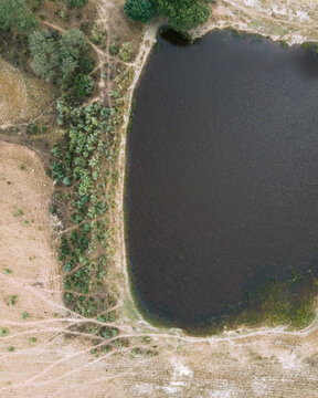 Aerial view of a pond in countryside along the Spanish and Portuguese border, Zebreira, Castel Branco, Portugal.