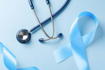 Blue awareness ribbon with stethoscope, world diabetes day on light background