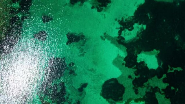 Aerial top down view of rocks in the Mediterranean Sea in Port Lligat Costa Brava Catalonia