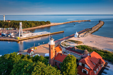 Lighthouse in Ustka by the Baltic Sea at sunrise, Poland.