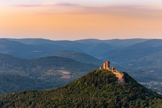 Burg Trifels Illuminated by the Setting Sun in Palatinate Forest seen from Rehbergturm, Rhineland-Palatinate, Germany, Europe